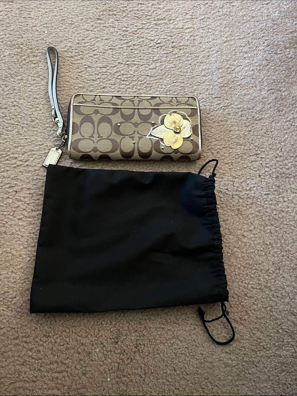 Coach Beige Signature Canvas Wristlet with Yellow Floral Applique